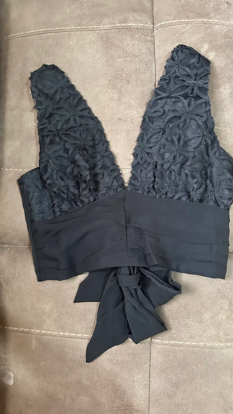 Blusa con agarre trasero 